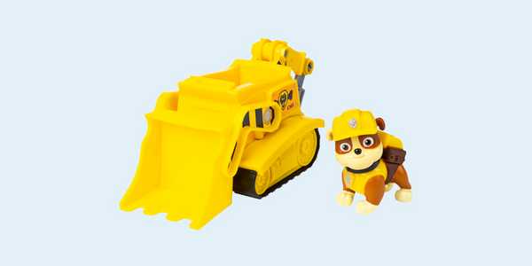 PAW Patrol character Rubble with his toy Bulldozer.